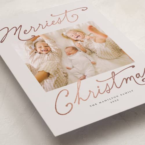 This is a eggnog foil pressed holiday cards with foil pressed by Rachel Mattern called merriest season printing on recycled smooth signature in standard
