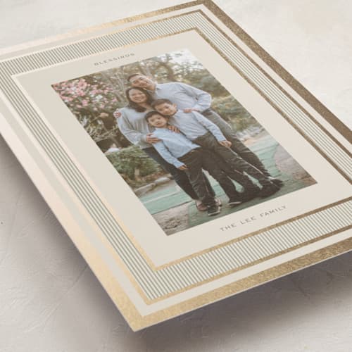 This is a champagne foil pressed holiday cards with foil pressed by Lori Wemple called classic stripe printing on recycled smooth signature in standard