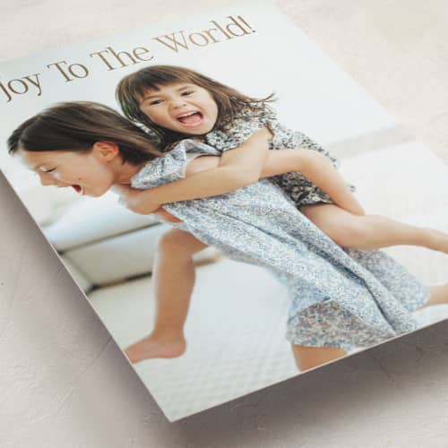 This is a caramel foil pressed holiday cards with foil pressed by Angela Thompson called abundant joy printing on recycled smooth signature in standard