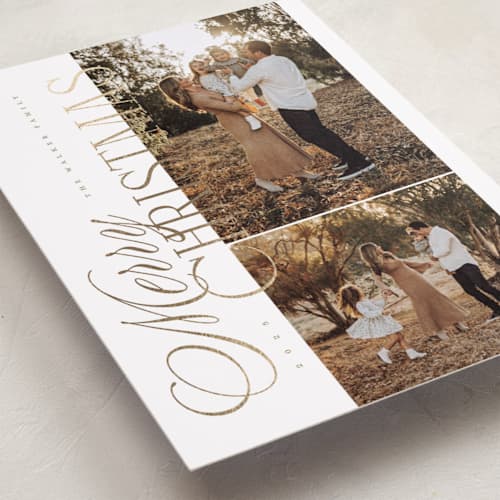 This is a tinsel foil pressed holiday cards with foil pressed by Kelly Schmidt called sideways merry printing on recycled smooth signature in standard