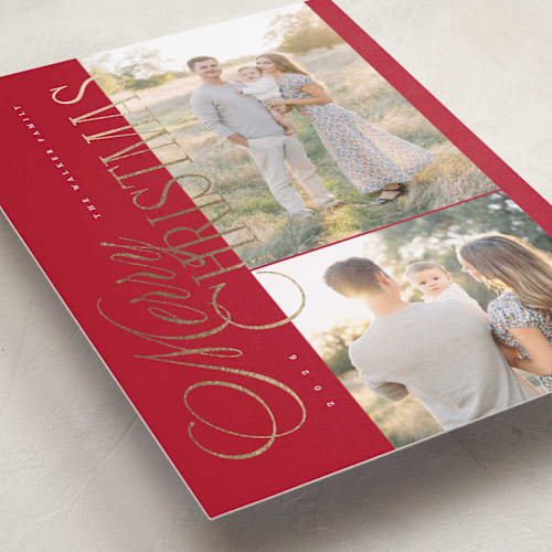 This is a poinsettia foil pressed holiday cards with foil pressed by Kelly Schmidt called sideways merry printing on recycled smooth signature in standard