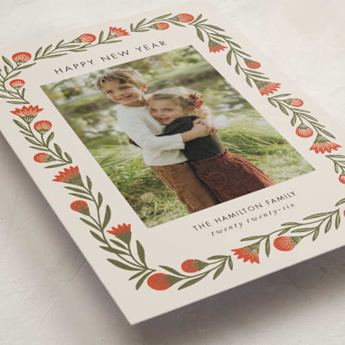 This is a candied apple foil pressed holiday cards with foil pressed by Jen Owens called wreath wrap printing on recycled smooth signature in standard