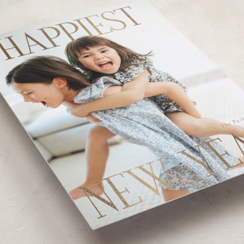 This is a gold leaf foil pressed holiday cards with foil pressed by Angela Thompson called new year joy printing on recycled smooth signature in standard