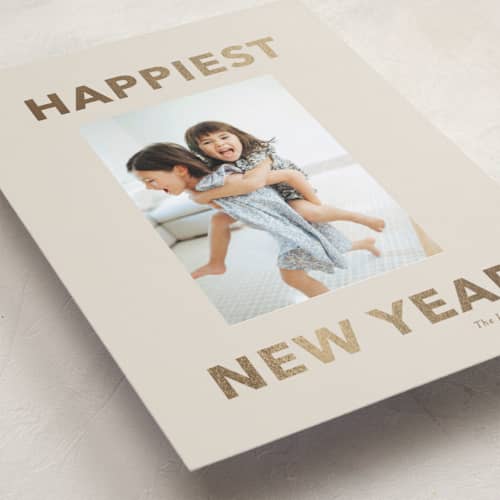 This is a linen foil pressed holiday cards with foil pressed by Angela Thompson called happiest! printing on recycled smooth signature in standard