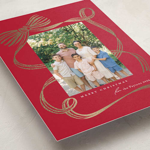 This is a cranberry foil pressed holiday cards with foil pressed by Carrie ONeal called neddy printing on recycled smooth signature in standard