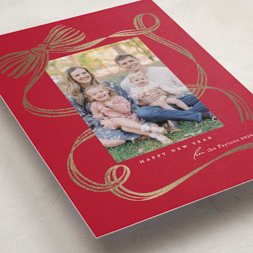 This is a cranberry foil pressed holiday cards with foil pressed by Carrie ONeal called neddy printing on recycled smooth signature in standard