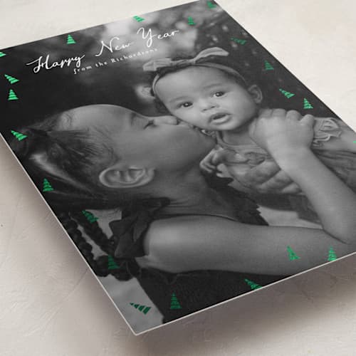 This is a snow foil pressed holiday cards with foil pressed by Heather Schertzer called tree lot printing on recycled smooth signature in standard