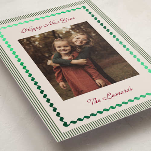 This is a holiday foil pressed holiday cards with foil pressed by Kelly Schmidt called vintage border printing on recycled smooth signature in standard