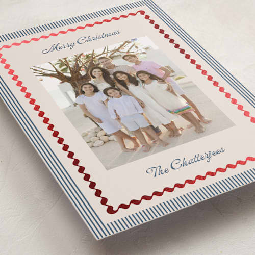 This is a navy foil pressed holiday cards with foil pressed by Kelly Schmidt called vintage border printing on recycled smooth signature in standard