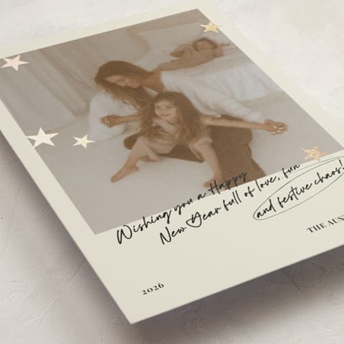 This is a buttercream foil pressed holiday cards with foil pressed by Helena Vitto called messy christmas printing on recycled smooth signature in standard