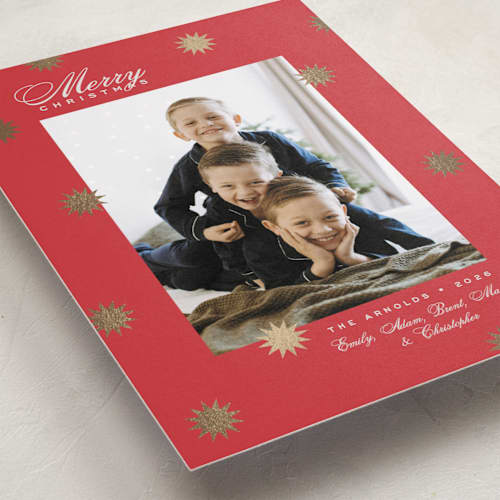 This is a ruby foil pressed holiday cards with foil pressed by Alston Foster called wonder printing on recycled smooth signature in standard