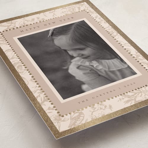 This is a caramel foil pressed holiday cards with foil pressed by Teju Reval called gilded toile printing on recycled smooth signature in standard