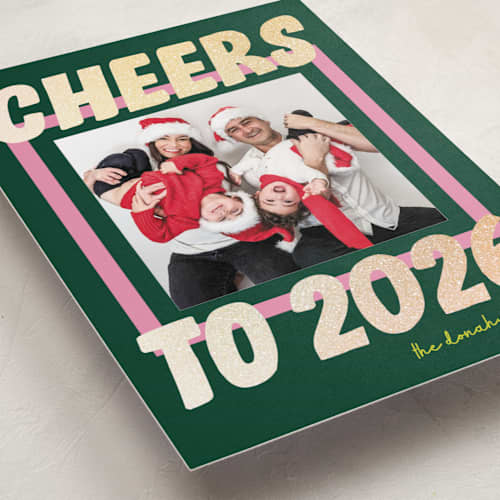 This is a evergreen foil pressed holiday cards with foil pressed by Shari Margolin called bold and bright printing on recycled smooth signature in standard