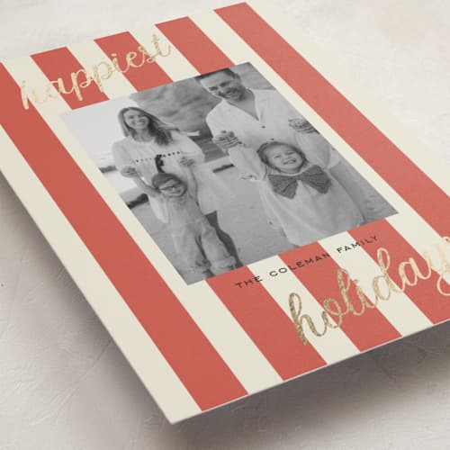 This is a berry foil pressed holiday cards with foil pressed by Louise Kay called happiest holidays printing on recycled smooth signature in standard