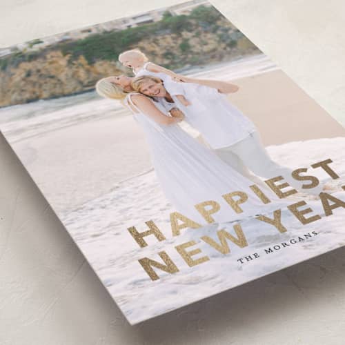 This is a ink foil pressed holiday cards with foil pressed by Angela Thompson called gilded happiness printing on recycled smooth signature in standard