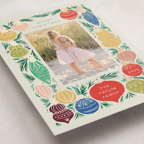 This is a sand foil pressed holiday cards with foil pressed by Alethea and Ruth called ornament tree frame printing on recycled smooth signature in standard