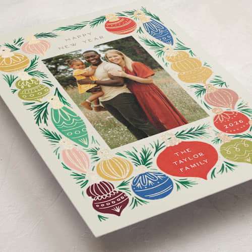 This is a sand foil pressed holiday cards with foil pressed by Alethea and Ruth called ornament tree frame printing on recycled smooth signature in standard