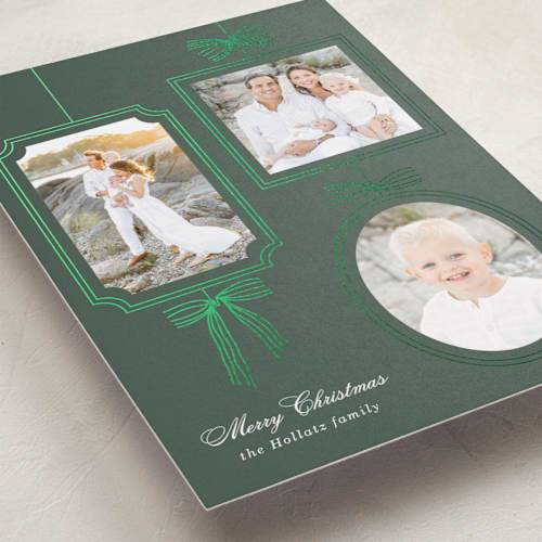This is a evergreen foil pressed holiday cards with foil pressed by Baumbirdy called bows printing on recycled smooth signature in standard