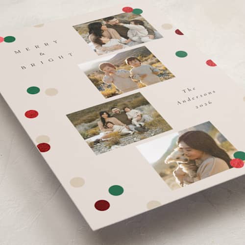 This is a ivory foil pressed holiday cards with foil pressed by Katie Zimpel called vintage confetti printing on recycled smooth signature in standard