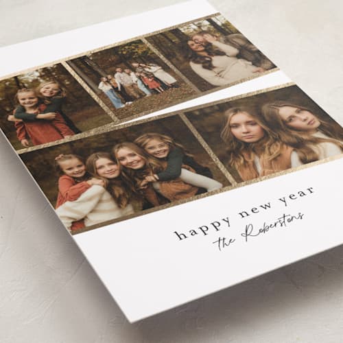 This is a snowflake foil pressed holiday cards with foil pressed by Jessica Williams called fancy film printing on recycled smooth signature in standard