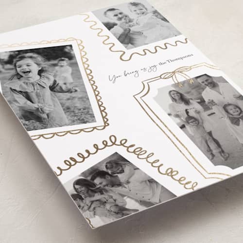 This is a snow foil pressed holiday cards with foil pressed by Joyce Pinheiro called memories framed printing on recycled smooth signature in standard