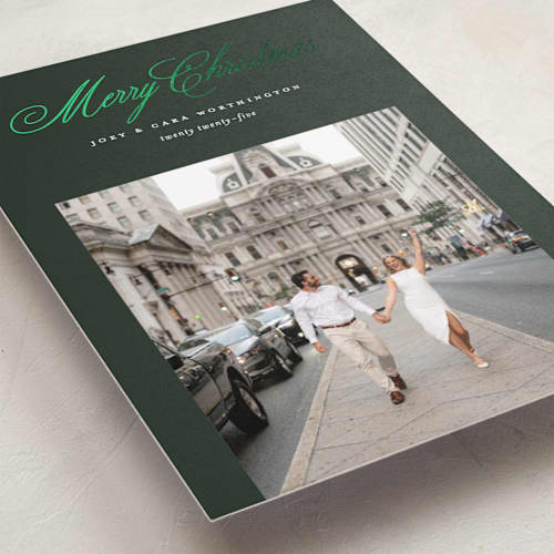 This is a evergreen foil pressed holiday cards with foil pressed by Pixel and Hank called most classic printing on recycled smooth signature in standard