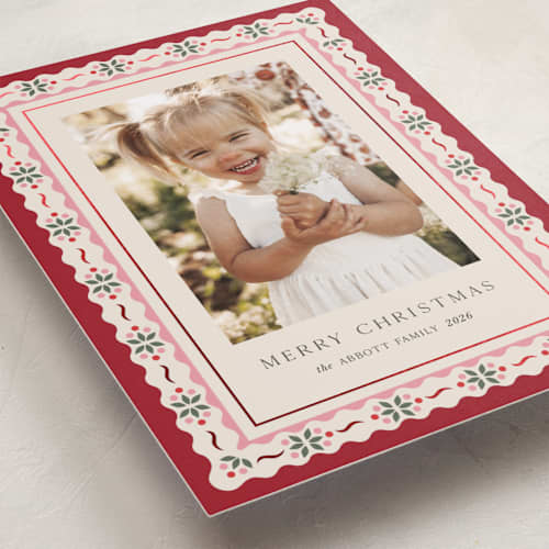 This is a poinsettia foil pressed holiday cards with foil pressed by Laura Bercovich called poinsettia in bloom printing on recycled smooth signature in standard