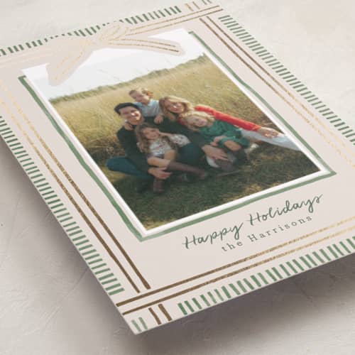 This is a moss foil pressed holiday cards with foil pressed by Chris Griffith called holiday wrap printing on recycled smooth signature in standard