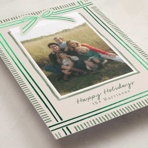 This is a moss foil pressed holiday cards with foil pressed by Chris Griffith called holiday wrap printing on recycled smooth signature in standard