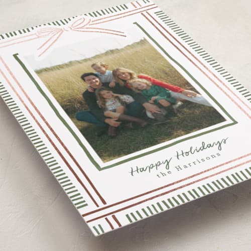 This is a pink sand foil pressed holiday cards with foil pressed by Chris Griffith called holiday wrap printing on recycled smooth signature in standard