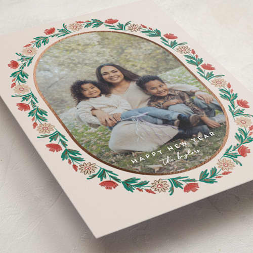 This is a eggnog foil pressed holiday cards with foil pressed by Amy Kross called laurel edge printing on recycled smooth signature in standard