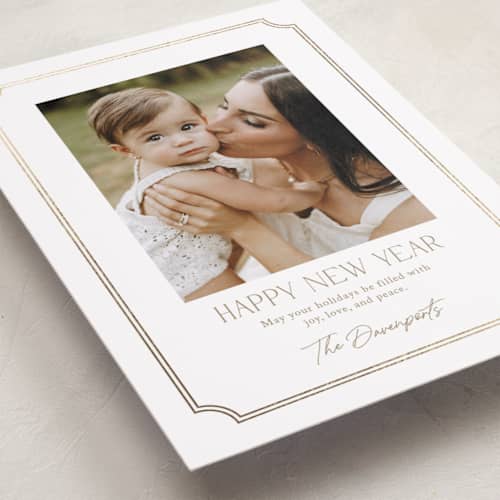 This is a snow foil pressed holiday cards with foil pressed by Yaling Hou Suzuki called holiday elegance printing on recycled smooth signature in standard