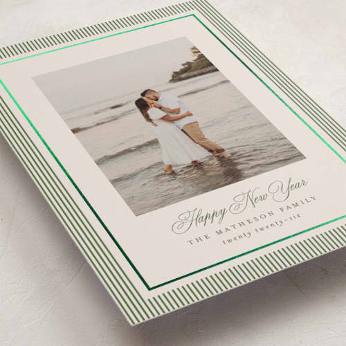 This is a cedar foil pressed holiday cards with foil pressed by Kelly Schmidt called striped elegance printing on recycled smooth signature in standard