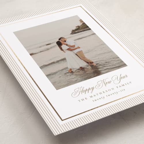 This is a tinsel foil pressed holiday cards with foil pressed by Kelly Schmidt called striped elegance printing on recycled smooth signature in standard