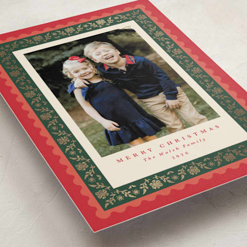 This is a holly berry foil pressed holiday cards with foil pressed by Olivia Raufman called folkloric printing on recycled smooth signature in standard