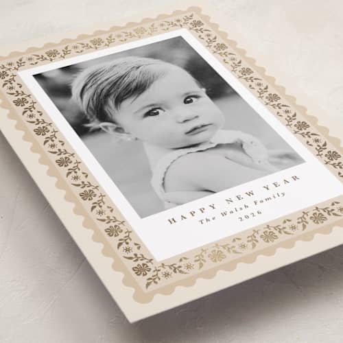 This is a eggnog foil pressed holiday cards with foil pressed by Olivia Raufman called folkloric printing on recycled smooth signature in standard