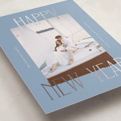 This is a waterfall foil pressed holiday cards with foil pressed by Kelly Watkins called maeve printing on recycled smooth signature in standard