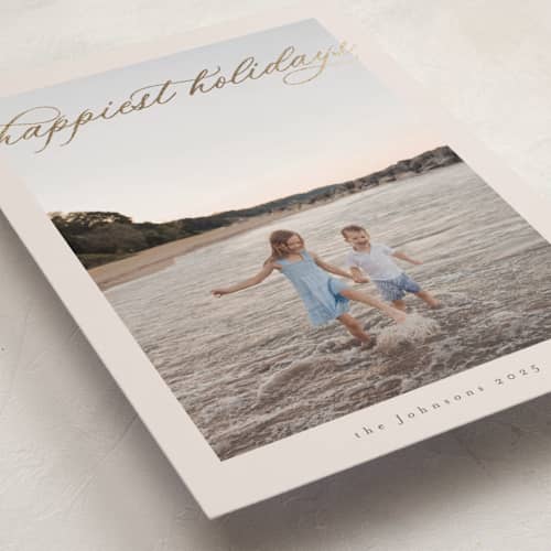 This is a champagne foil pressed holiday cards with foil pressed by Nicole Walsh called serene printing on recycled smooth signature in standard