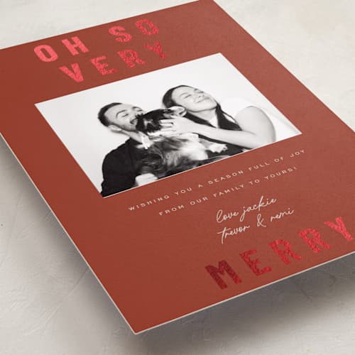 This is a holly foil pressed holiday cards with foil pressed by Sierra Lee called oh so very merry printing on recycled smooth signature in standard