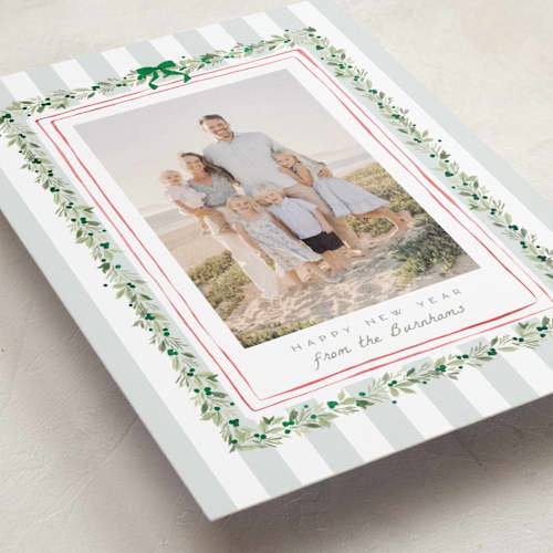 This is a winter mint foil pressed holiday cards with foil pressed by Everett Paper Goods called coastal garland printing on recycled smooth signature in standard