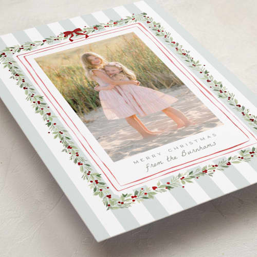 This is a winter mint foil pressed holiday cards with foil pressed by Everett Paper Goods called coastal garland printing on recycled smooth signature in standard