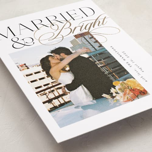 This is a snow foil pressed holiday cards with foil pressed by Jackie Crawford called scripted bright printing on recycled smooth signature in standard