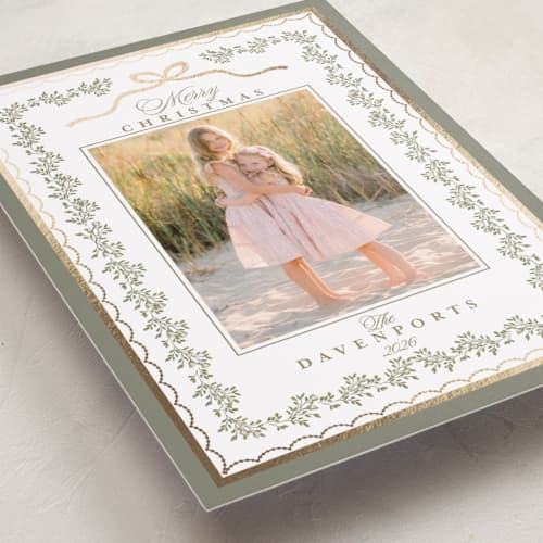 This is a sage foil pressed holiday cards with foil pressed by Susan Moyal called vintage vine printing on recycled smooth signature in standard