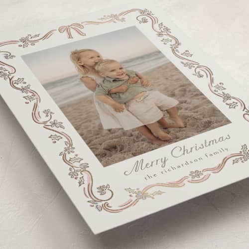 This is a rose foil pressed holiday cards with foil pressed by Chris Griffith called holiday falala printing on recycled smooth signature in standard