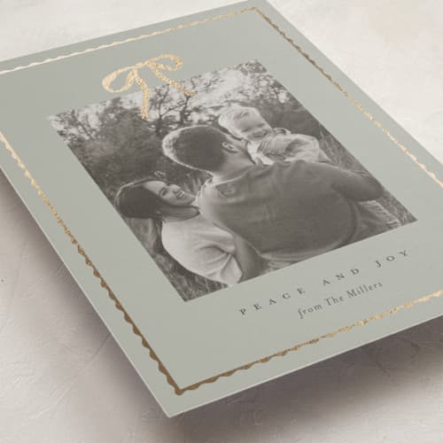 This is a mint foil pressed holiday cards with foil pressed by Kasia Sikorska called brightly wrapped printing on recycled smooth signature in standard