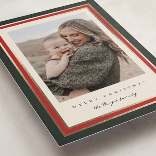 This is a wreath foil pressed holiday cards with foil pressed by Emily Sabol Goss called linear frame printing on recycled smooth signature in standard