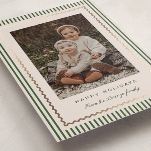This is a cedar foil pressed holiday cards with foil pressed by Kelly Schmidt called squiggle border printing on recycled smooth signature in standard