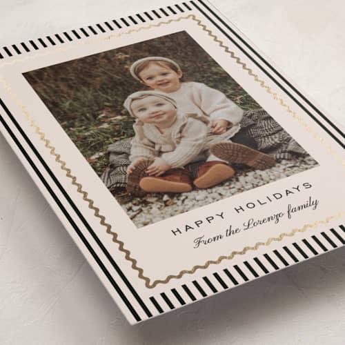 This is a coal foil pressed holiday cards with foil pressed by Kelly Schmidt called squiggle border printing on recycled smooth signature in standard