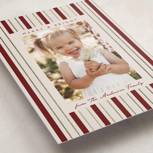 This is a candy cane foil pressed holiday cards with foil pressed by Elly called candy stripes printing on recycled smooth signature in standard