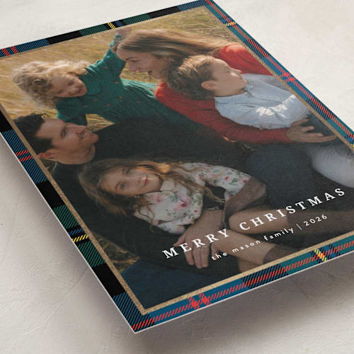 This is a navy foil pressed holiday cards with foil pressed by Ilene Guy called traditionally plaid printing on recycled smooth signature in standard